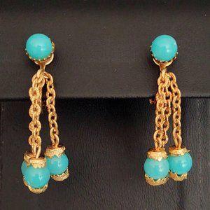 Clip on gold and blue dangle earrings